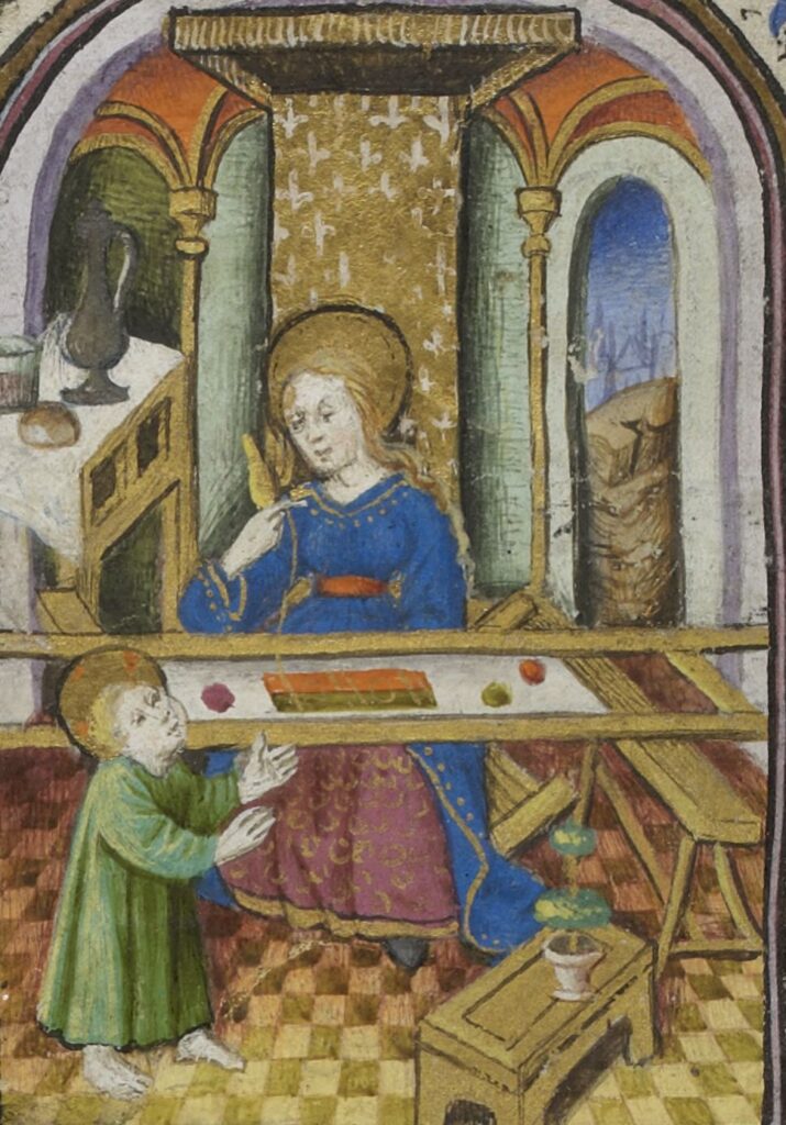 Enluminure médiévale représentant l'enfance de Jésus. Avec l'enfant qui marche au pied d'un métier à broder posé sur des tréteaux. Derrière, Marie assis en train de travailler sur l'ouvrage.